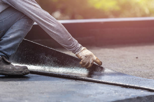 Professional Waterproofing technician working in Toledo, IL